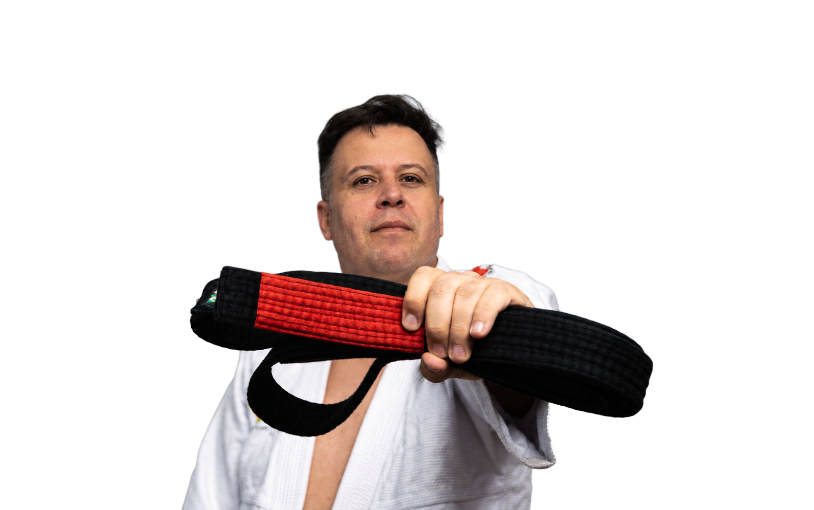 Cruz faixa-preta de jiu-jítsu segurando sua faixa